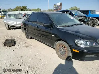 2002 Mitsubishi Lancer ES with VIN JA3AJ26E72U062280, listed as a Copart auction lot 75810384 with 136,149 mi miles and Salvage Title. Bid and sale history available at carsss.com. Image 11.