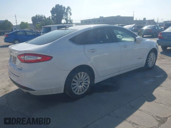 2014 Ford Fusion SE Hybrid with VIN 3FA6P0LU5ER256992, listed as a IAAI auction lot 42229147 with 235,583 mi miles and . Bid and sale history available at DreamBid. Image 4.