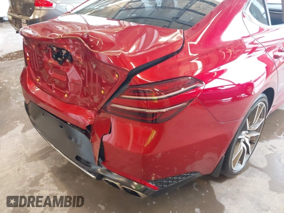 2022 Genesis G70 2.0T with VIN KMTG34TA3NU086889, listed as a IAAI auction lot 42205079 with 51,792 mi miles and . Bid and sale history available at DreamBid. Image 18.