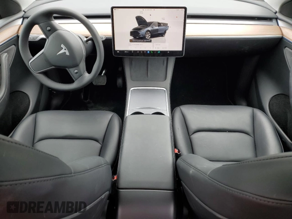 2024 Tesla Model Y Long Range with VIN 7SAYGDEE9RF069801, listed as a Copart auction lot 60857145 with 18,808 mi miles and Salvage title. Bid and sale history available at DreamBid. Image 8.