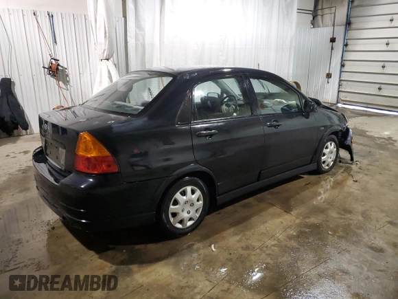 2003 Suzuki Aerio S z VIN JS2RA41S035159741, wystawiony jako Copart lot #88080235 z przebiegiem Nie podano mil oraz Szkoda całkowita • Salvage title. Historia ofert i sprzedaży dostępna na DreamBid. Obrazek 3.