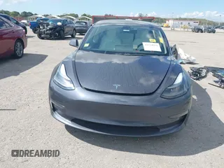2022 Tesla Model 3 Performance with VIN 5YJ3E1EC9NF201184, listed as a IAAI auction lot 41534959 with 29,389 mi miles and . Bid and sale history available at DreamBid. Image 13.