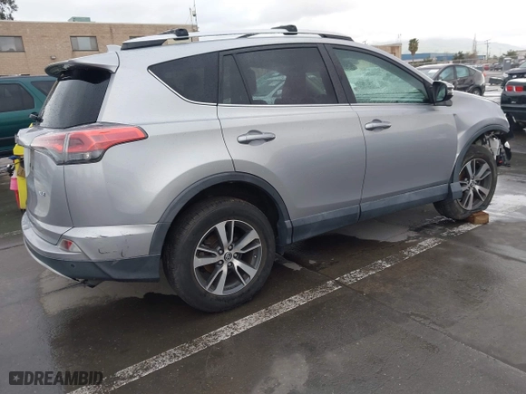 2016 Toyota RAV4 XLE with VIN 2T3WFREV7GW251931, listed as a IAAI auction lot 41906274 with 55,700 mi miles. Bid and sale history available at carsss.com. Image 4.