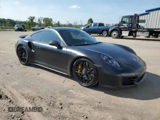 2014 Porsche 911 Turbo with VIN WP0AD2A90ES167116, listed as a Copart auction lot 69284504 with 67,701 mi miles and Salvage Title. Bid and sale history available at carsss.com. Image 4.