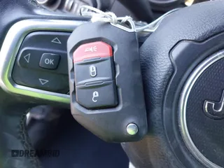 2019 Jeep Wrangler Unlimited Sahara с VIN 1C4HJXEN9KW509839, выставлен на аукционе IAAI как лот 41054085 с пробегом 78 850 миль миль и . История ставок и продаж доступна на DreamBid. Изображение 11.