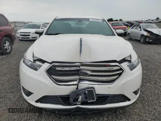2016 Ford Taurus SEL z VIN 1FAHP2E87GG146931, wystawiony jako Copart lot #56135655 z przebiegiem 99 733 mil mil oraz Szkoda całkowita • Salvage title. Historia ofert i sprzedaży dostępna na DreamBid. Obrazek 5.