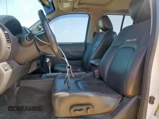 2012 Nissan Frontier Pro-4X with VIN 1N6AD0EV3CC468057, listed as a Copart auction lot 60432675 with 100,088 mi miles and Salvage title. Bid and sale history available at DreamBid. Image 7.