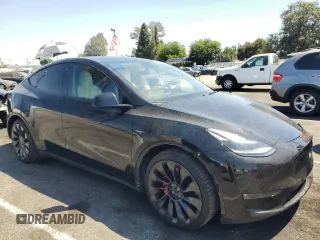 2022 Tesla Model Y Performance with VIN 7SAYGDEF4NF436834, listed as a Copart auction lot 68992234 with 22,171 mi miles and Salvage title. Bid and sale history available at DreamBid. Image 4.
