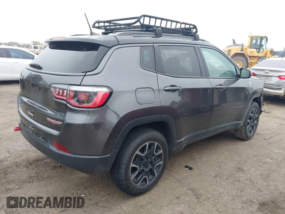 2019 Jeep Compass Trailhawk with VIN 3C4NJDDB1KT739938, listed as a IAAI auction lot 41411173 with 140,396 mi miles and . Bid and sale history available at carsss.com. Image 4.