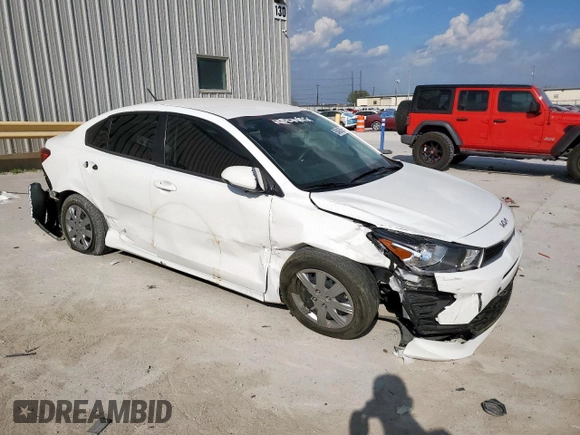 2023 Kia Rio S with VIN 3KPA24AD7PE549736, listed as a Copart auction lot 50428615 with 34,431 mi miles and Salvage Title. Bid and sale history available at carsss.com. Image 4.
