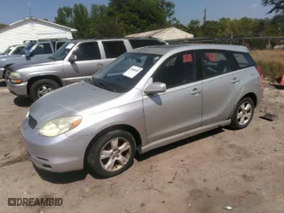 2004 Toyota Matrix Std with VIN 2T1KR32E04C211462, listed as a IAAI auction lot 42084005 with 299,999 mi miles. Bid and sale history available at carsss.com. Image 2.