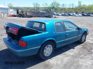 1992 Mercury Cougar z VIN 1MEPM6043NH646925, wystawiony jako IAAI lot #42128701 z przebiegiem 37 103 mil mil oraz . Historia ofert i sprzedaży dostępna na DreamBid. Obrazek 4.