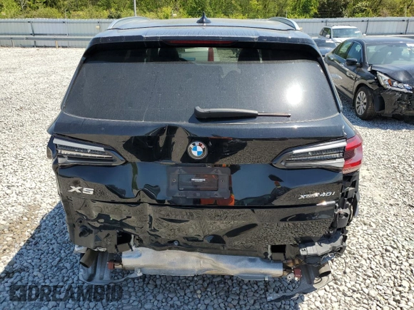 2023 BMW X5 xDrive40i with VIN 5UXCR6C08P9R06807, listed as a Copart auction lot 52030505 with 43,600 mi miles and Salvage title. Bid and sale history available at DreamBid. Image 6.