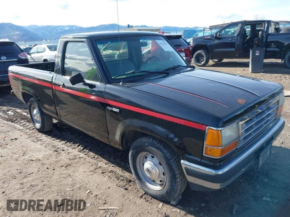 1990 Ford Ranger XLT with VIN 1FTCR10AXLUB92428, listed as a IAAI auction lot 41710370 with 31,036 mi miles. Bid and sale history available at carsss.com. Image 1.