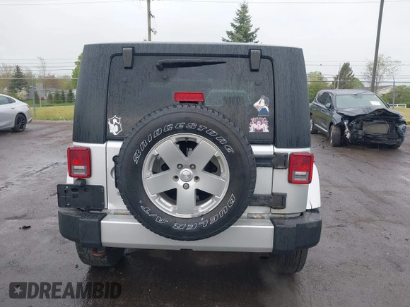 2010 Jeep Wrangler Sahara с VIN 1J4AA5D10AL166398, выставлен на аукционе IAAI как лот 42144530 с пробегом 140 020 миль миль и . История ставок и продаж доступна на DreamBid. Изображение 16.