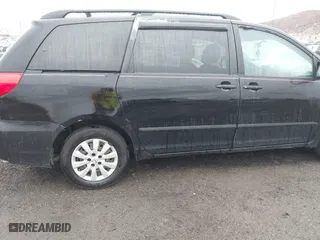 2010 Toyota Sienna CE with VIN 5TDKK4CC6AS343068, listed as a IAAI auction lot 41973330 with 327,086 mi miles. Bid and sale history available at carsss.com. Image 12.