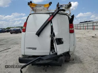 2013 Chevrolet Express Cargo with VIN 1GCWGFBA4D1105381, listed as a Copart auction lot 60138065 with 209,922 mi miles and Salvage title. Bid and sale history available at DreamBid. Image 6.
