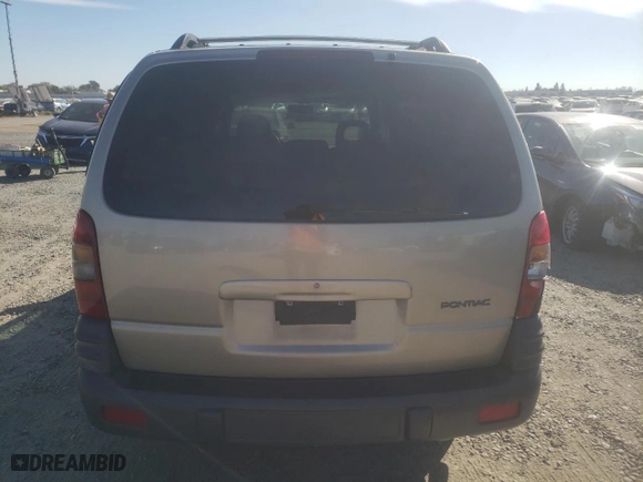1997 Pontiac Montana with VIN 1GMDX03EXVD290246, listed as a Copart auction lot 77526084 with 127,447 mi miles and Salvage Title. Bid and sale history available at carsss.com. Image 6.