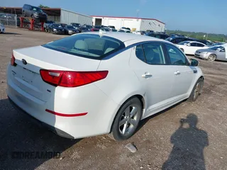 2015 Kia Optima LX with VIN 5XXGM4A77FG360573, listed as a IAAI auction lot 42648488 with 132,409 mi miles and . Bid and sale history available at DreamBid. Image 4.