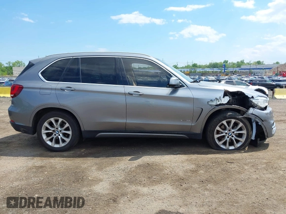 2014 BMW X5 xDrive35i z VIN 5UXKR0C5XE0K43570, wystawiony jako IAAI lot #42211578 z przebiegiem 260 817 mil mil oraz . Historia ofert i sprzedaży dostępna na DreamBid. Obrazek 13.
