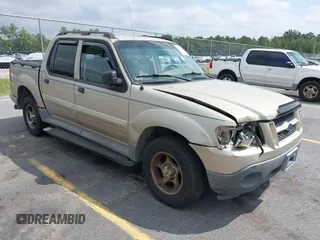 2005 Ford Explorer Sport Trac XLS z VIN 1FMZU67K55UA46974, wystawiony jako IAAI lot #42861498 z przebiegiem 100 711 mil mil oraz . Historia ofert i sprzedaży dostępna na DreamBid. Obrazek 1.