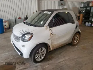 2016 Smart fortwo Passion with VIN WMEFJ5DA3GK141216, listed as a Copart auction lot 58088015 with 77,753 mi miles and Salvage title. Bid and sale history available at DreamBid. Image 1.