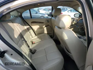 2005 Jaguar S-Type with VIN SAJWA01T55FN14254, listed as a Copart auction lot 86994974 with 126,484 mi miles and Salvage Title. Bid and sale history available at DreamBid. Image 10.