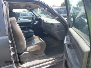 2004 Chevrolet Silverado 1500 Work Truck with VIN 2GCEC19V341293632, listed as a IAAI auction lot 42160525 with 243,632 mi miles. Bid and sale history available at carsss.com. Image 5.