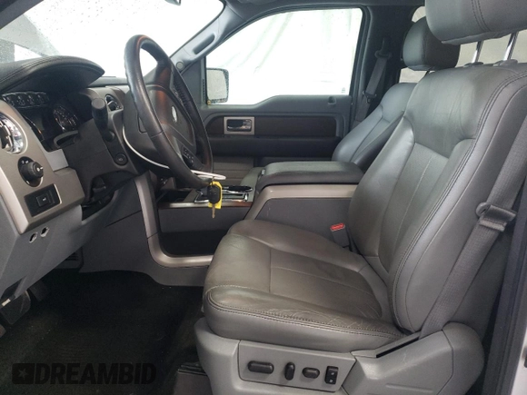 2013 Ford F-150 XL with VIN 1FTFW1ET6DFA77461, listed as a Copart auction lot 56497205 with 140,694 mi miles and Salvage title. Bid and sale history available at DreamBid. Image 7.