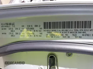 2015 Ram 1500 Lone Star with VIN 1C6RR6GT9FS779001, listed as a IAAI auction lot 41661684 with 133,048 mi miles. Bid and sale history available at carsss.com. Image 9.