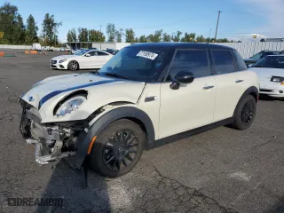 2015 MINI Cooper Hardtop 4 Door with VIN WMWXS5C59FT830039, listed as a Copart auction lot 77198974 with 43,277 mi miles and Salvage Title. Bid and sale history available at carsss.com. Image 1.