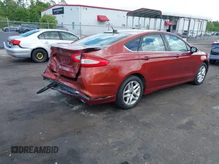 2014 Ford Fusion SE with VIN 3FA6P0H70ER364570, listed as a IAAI auction lot 42147544 with 107,060 mi miles and . Bid and sale history available at DreamBid. Image 4.