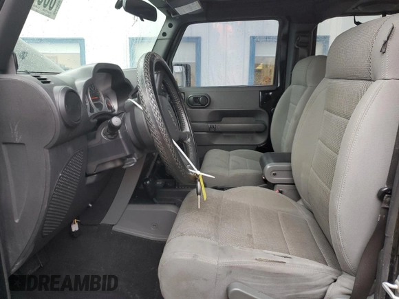 2007 Jeep Wrangler Unlimited Rubicon with VIN 1J8GA69147L113994, listed as a Copart auction lot 86544434 with 100,251 mi miles and Salvage title. Bid and sale history available at DreamBid. Image 7.