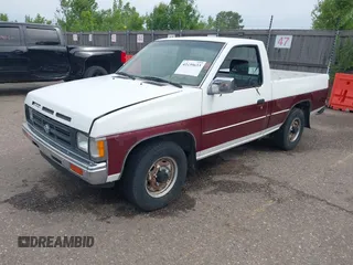 1991 Nissan Frontier XE with VIN 1N6SD11SXMC410552, listed as a IAAI auction lot 42439633 with 137,350 mi miles and . Bid and sale history available at DreamBid. Image 2.