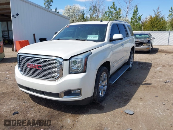 2015 GMC Yukon Denali with VIN 1GKS1CKJ5FR285199, listed as a IAAI auction lot 41763187 with 135,265 mi miles. Bid and sale history available at carsss.com. Image 17.