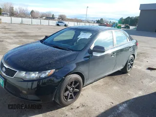 2013 Kia Forte EX with VIN KNAFU4A2XD5716268, listed as a IAAI auction lot 41836757 with 123,481 mi miles. Bid and sale history available at carsss.com. Image 2.
