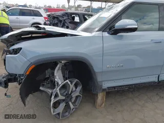 2023 Rivian R1T Adventure with VIN 7FCTGBAA9PN027894, listed as a IAAI auction lot 42061339 with 5,047 mi miles. Bid and sale history available at carsss.com. Image 23.