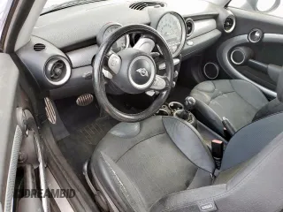 2010 MINI Hardtop S with VIN WMWMF7C51ATZ69061, listed as a Copart auction lot 60837465 with 102,506 mi miles and Salvage title. Bid and sale history available at DreamBid. Image 8.