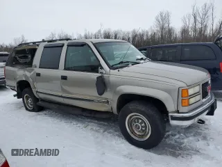 1999 GMC Suburban with VIN 3GKGK26J7XG537043, listed as a Copart auction lot 44683575 with 196,124 mi miles and Salvage Title. Bid and sale history available at carsss.com. Image 4.