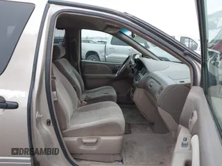 2002 Toyota Sienna LE with VIN 4T3ZF13C42U418853, listed as a IAAI auction lot 41248253 with 193,986 mi miles. Bid and sale history available at carsss.com. Image 5.