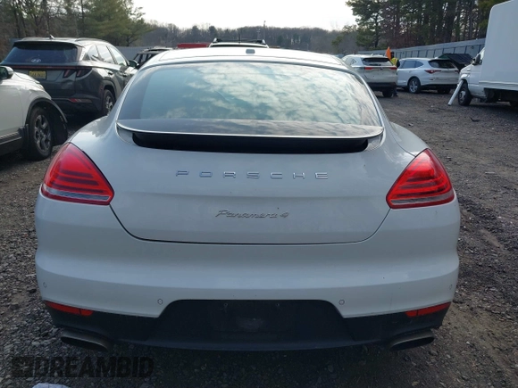 2016 Porsche Panamera 4 z VIN WP0AA2A78GL002029, wystawiony jako IAAI lot #41644555 z przebiegiem 54 915 mil mil oraz . Historia ofert i sprzedaży dostępna na DreamBid. Obrazek 16.