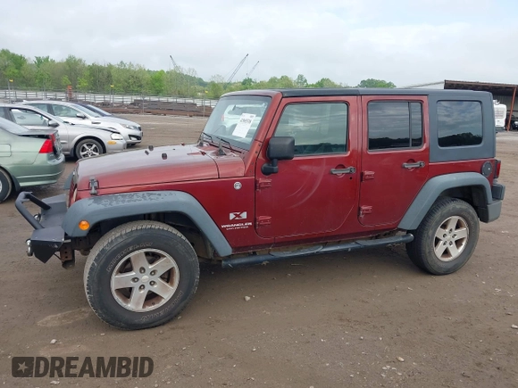 2008 Jeep Wrangler Unlimited X with VIN 1J4GA39108L606685, listed as a IAAI auction lot 41965538 with 288,946 mi miles. Bid and sale history available at carsss.com. Image 14.