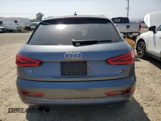 2015 Audi Q3 Prestige with VIN WA1GFCFS8FR009731, listed as a Copart auction lot 59897225 with 84,138 mi miles and Salvage title. Bid and sale history available at DreamBid. Image 6.