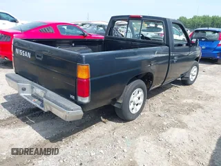 1997 Nissan Frontier XE with VIN 1N6SD11SXVC320206, listed as a IAAI auction lot 42435128 with 299,944 mi miles and . Bid and sale history available at DreamBid. Image 4.