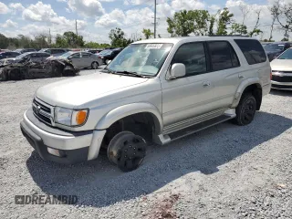 2000 Toyota 4Runner SR5 z VIN JT3HN86R3Y0277802, wystawiony jako Copart lot #60646825 z przebiegiem 215 251 mil mil oraz Czysty tytuł • Clean title. Historia ofert i sprzedaży dostępna na DreamBid. Obrazek 1.