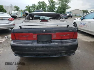 1989 Ford Thunderbird z VIN 1FAPP64R0KH161691, wystawiony jako Copart lot #60097275 z przebiegiem 70 041 mil mil oraz Szkoda całkowita • Salvage title. Historia ofert i sprzedaży dostępna na DreamBid. Obrazek 6.