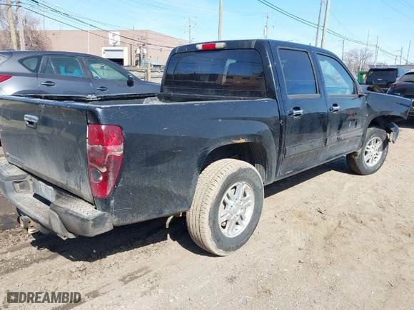 2011 Chevrolet Colorado LT w/1LT with VIN 1GCHTCFE5B8139026, listed as a IAAI auction lot 41786530 with 173,482 mi miles. Bid and sale history available at carsss.com. Image 4.