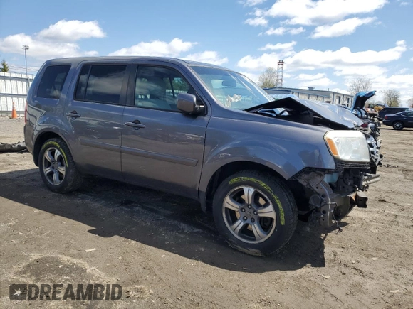 2015 Honda Pilot SE with VIN 5FNYF4H36FB055134, listed as a Copart auction lot 52310075 with 171,753 mi miles and Salvage Title. Bid and sale history available at DreamBid. Image 4.
