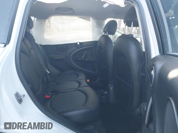 2015 MINI Cooper Countryman S with VIN WMWZC5C50FWP42324, listed as a IAAI auction lot 41795698 with 95,746 mi miles. Bid and sale history available at carsss.com. Image 8.