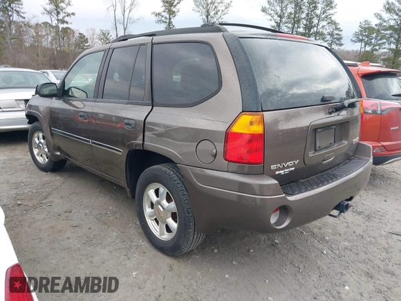 2008 GMC Envoy SLE2 with VIN 1GKDS13S882139862, listed as a IAAI auction lot 41458976 with 195,973 mi miles. Bid and sale history available at carsss.com. Image 3.